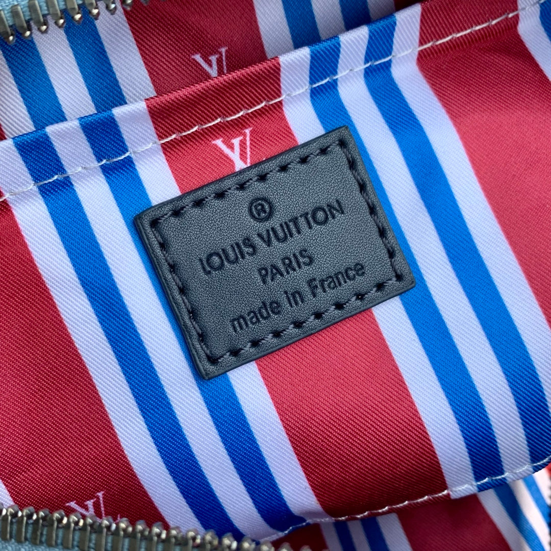 Louis Vuitton Keepall Bandoulière 25 Insky Blue Monogram Heritage Canvas Dark Blue Calfskin Bag