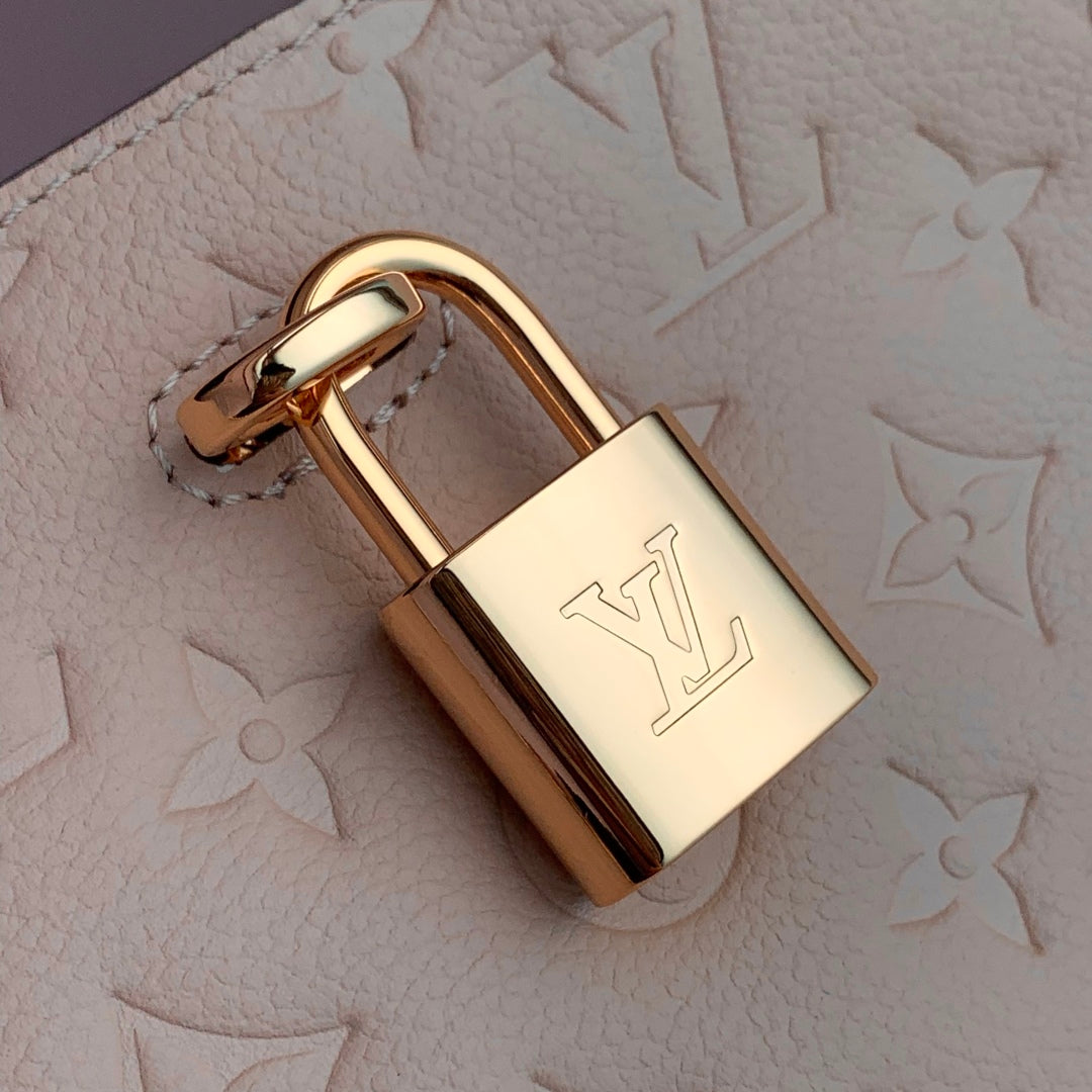 Louis Vuitton Anytime MM 42 in Nude Pink Monogram Empreinte Calfskin Bag