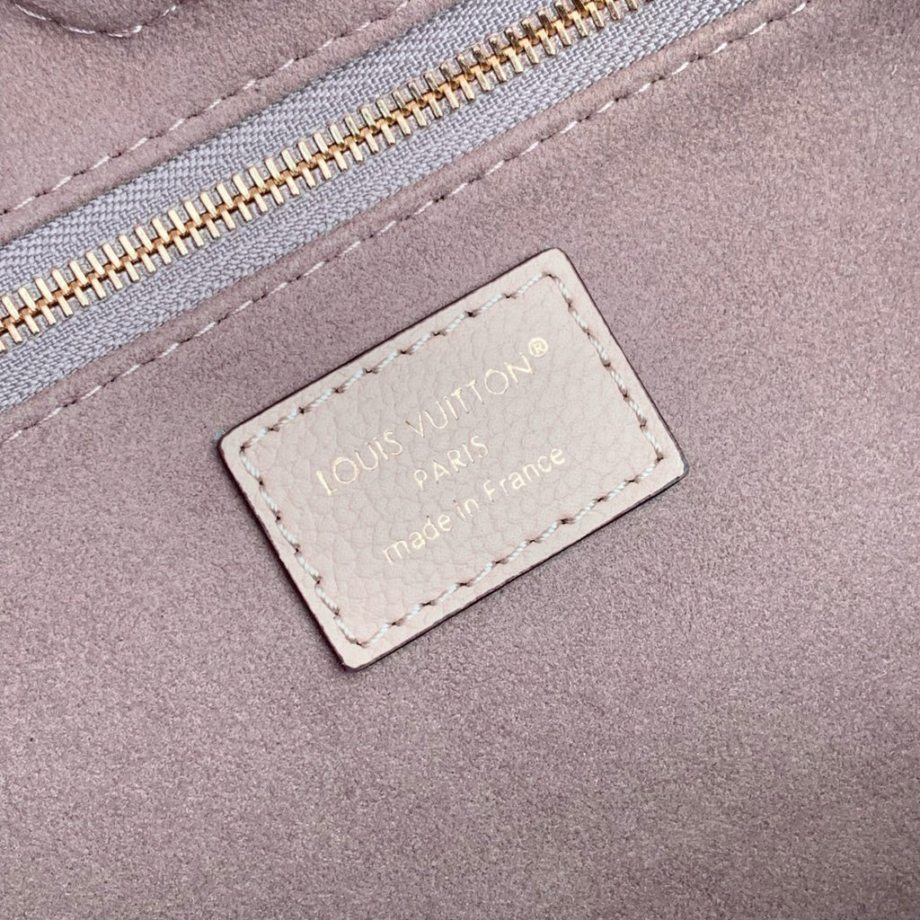 Louis Vuitton Anytime MM 42 in Nude Pink Monogram Empreinte Calfskin Bag