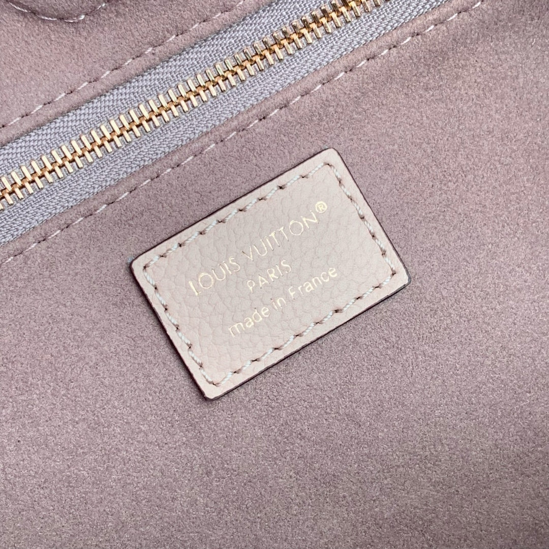 Louis Vuitton Anytime MM 42 in Nude Pink Monogram Empreinte Calfskin Bag
