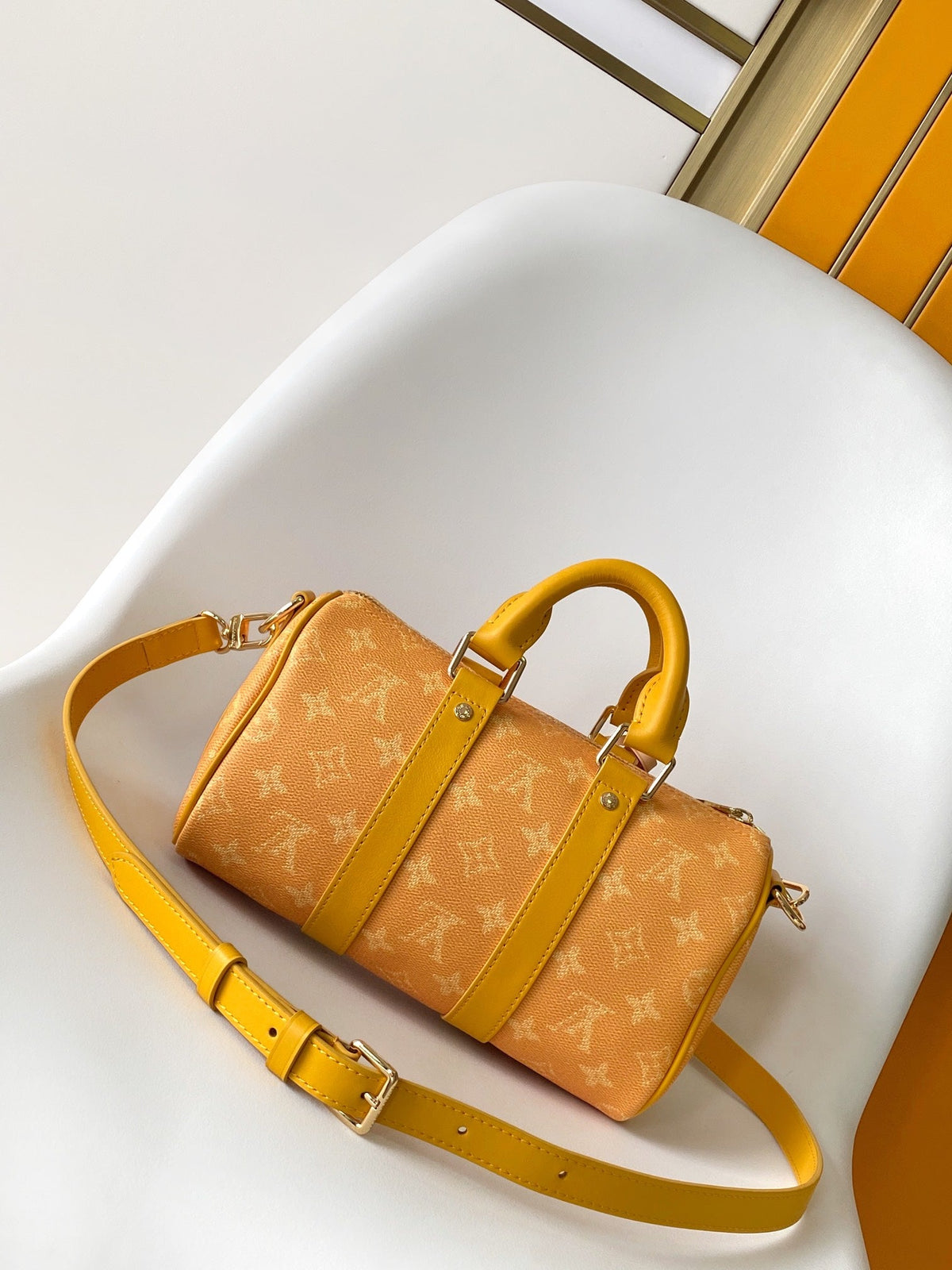 Louis Vuitton Keepall Bandoulière 25 in Orange Monogram Heritage Canvas Bag