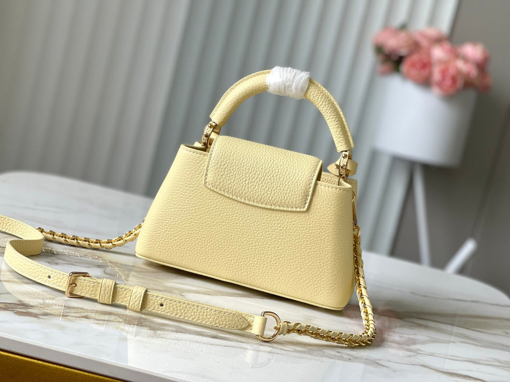 Louis Vuitton Capucines East-West Mini 22 in Banana Yellow Taurillon Gold Hardware Bag