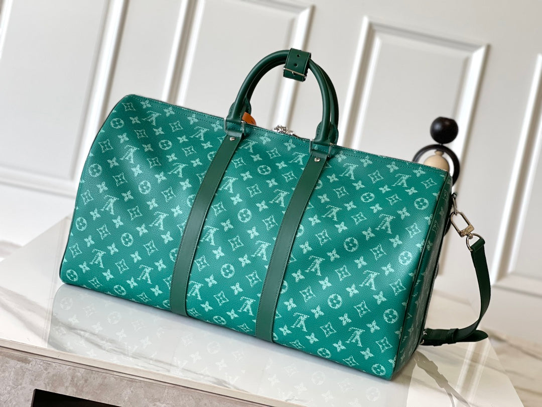Louis Vuitton Keepall Bandoulière 50 in Green Monogram Heritage Canvas Bag