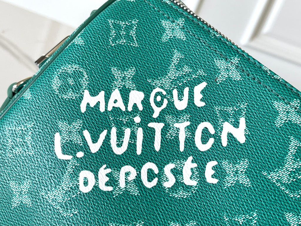 Louis Vuitton Keepall Bandoulière 50 in Green Monogram Heritage Canvas Bag