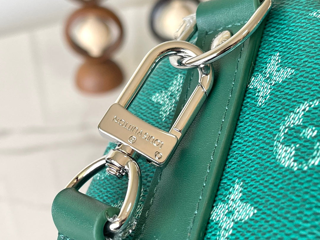 Louis Vuitton Keepall Bandoulière 25 in Green Monogram Heritage Canvas Bag
