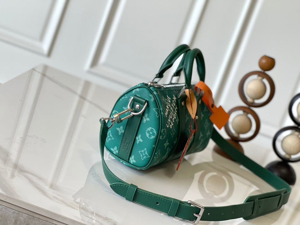 Louis Vuitton Keepall Bandoulière 25 in Green Monogram Heritage Canvas Bag