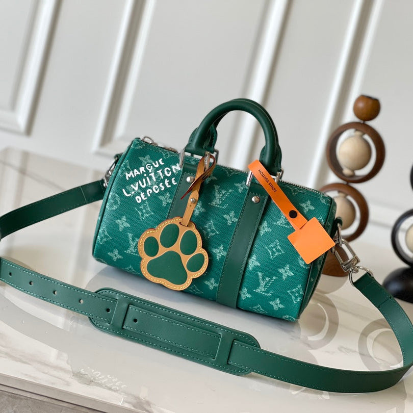 Louis Vuitton Keepall Bandoulière 25 in Green Monogram Heritage Canvas Bag